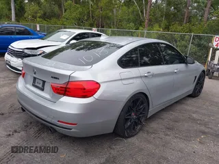 2015 BMW 4 Series 435i with VIN WBA4B1C58FG241018, listed as a IAAI auction lot 41401671 with 79,369 mi miles. Bid and sale history available at carsss.com. Image 4.