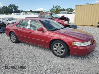 2002 Cadillac Seville Touring STS z VIN 1G6KY54922U288481, wystawiony jako Copart lot #68859394 z przebiegiem 63 612 mil mil oraz Szkody całkowita. Historia ofert i sprzedaży dostępna na DreamBid. Obrazek 4.