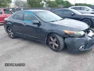 2012 Acura TSX Tech Pkg with VIN JH4CU2F64CC015059, listed as a IAAI auction lot 41706390 with 131,913 mi miles. Bid and sale history available at carsss.com. Image 1.