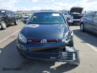 2012 Volkswagen GTI with VIN WVWHV7AJ6CW178615, listed as a IAAI auction lot 41975014 with 60,698 mi miles. Bid and sale history available at carsss.com. Image 12.