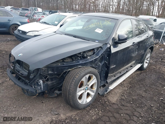 2011 BMW X6 35i with VIN 5UXFG2C58BLX08487, listed as a IAAI auction lot 41627394 with 999,999 mi miles. Bid and sale history available at carsss.com. Image 2.