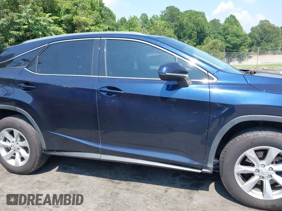 2016 Lexus RX 350 with VIN JTJBZMCA6G2000462, listed as a IAAI auction lot 42612651 with 116,158 mi miles and . Bid and sale history available at DreamBid. Image 13.