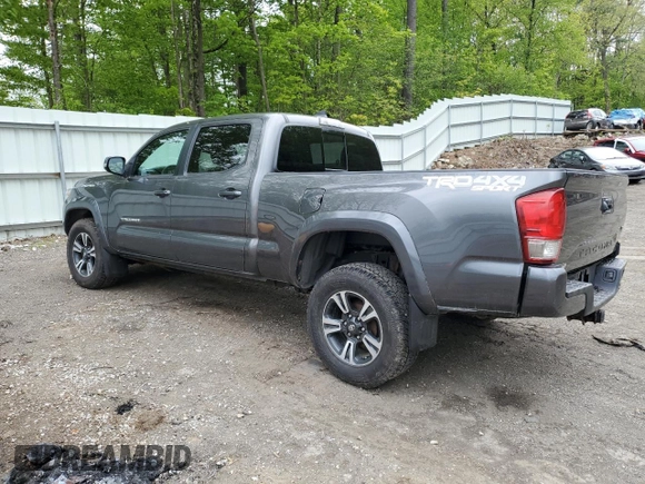 2017 Toyota Tacoma SR5 z VIN 3TMDZ5BN6HM017990, wystawiony jako Copart lot #57982205 z przebiegiem 51 890 mil mil oraz Szkoda całkowita • Salvage title. Historia ofert i sprzedaży dostępna na DreamBid. Obrazek 2.