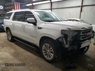 2023 GMC Yukon XL SLT with VIN 1GKS2GKD7PR114941, listed as a Copart auction lot 50928805 with 40,887 mi miles and Salvage Title. Bid and sale history available at carsss.com. Image 4.