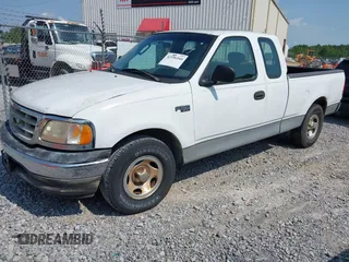 2003 Ford F-150 XL with VIN 1FTRX17203NB20937, listed as a IAAI auction lot 42396166 with 239,737 mi miles and . Bid and sale history available at DreamBid. Image 2.