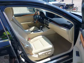 2015 Lexus ES 300h with VIN JTHBW1GG7F2083096, listed as a IAAI auction lot 42107914 with 146,191 mi miles and . Bid and sale history available at DreamBid. Image 5.