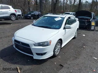 2010 Mitsubishi Lancer ES with VIN JA32U2FU9AU027824, listed as a IAAI auction lot 41992311 with 239,422 mi miles. Bid and sale history available at carsss.com. Image 2.
