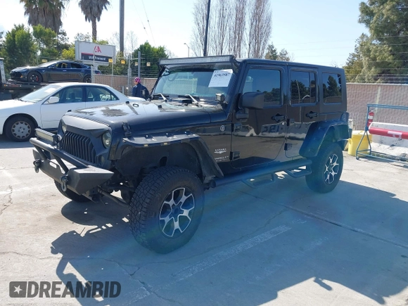 2008 Jeep Wrangler Unlimited Sahara with VIN 1J8GA59168L587554, listed as a IAAI auction lot 41963587 with 189,943 mi miles and . Bid and sale history available at DreamBid. Image 17.
