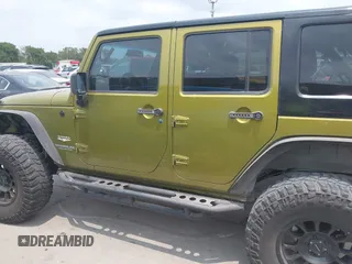 2008 Jeep Wrangler Unlimited Sahara with VIN 1J8GA59108L574959, listed as a IAAI auction lot 42171011 with Not Provided miles and . Bid and sale history available at carsss.com. Image 14.