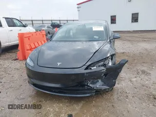 2025 Tesla Model 3 Long Range with VIN 5YJ3E1EA5SF911256, listed as a IAAI auction lot 41509976 with 1,806 mi miles. Bid and sale history available at carsss.com. Image 11.
