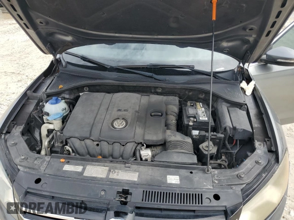 2012 Volkswagen Passat SE z VIN 1VWBP7A32CC063994, wystawiony jako Copart lot #59270995 z przebiegiem 169 999 mil mil oraz Szkoda całkowita • Salvage title. Historia ofert i sprzedaży dostępna na DreamBid. Obrazek 11.