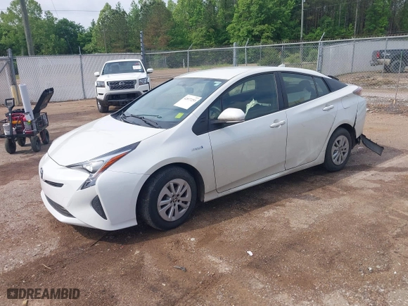 2016 Toyota Prius Two with VIN JTDKBRFU3G3523524, listed as a IAAI auction lot 42077253 with 293,150 mi miles. Bid and sale history available at carsss.com. Image 2.
