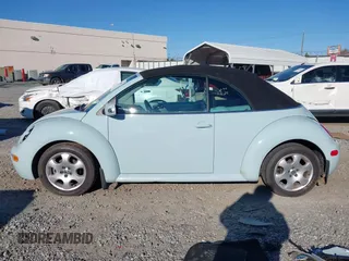 2003 Volkswagen Beetle GLS z VIN 3VWCK21YX3M304572, wystawiony jako IAAI lot #41286079 z przebiegiem 42 450 mil mil oraz . Historia ofert i sprzedaży dostępna na DreamBid. Obrazek 14.