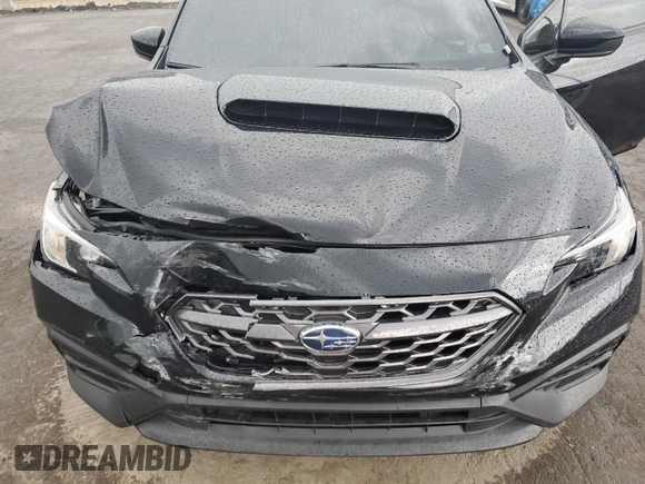 2023 Subaru WRX Premium z VIN JF1VBAF63P9821154, wystawiony jako Copart lot #61098765 z przebiegiem Nie podano mil oraz Szkoda całkowita • Salvage title. Historia ofert i sprzedaży dostępna na DreamBid. Obrazek 11.