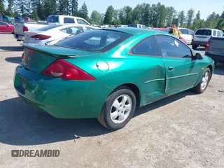 2002 Mercury Cougar z VIN 1ZWFT603725617814, wystawiony jako IAAI lot #42354235 z przebiegiem 236 231 mil mil oraz . Historia ofert i sprzedaży dostępna na DreamBid. Obrazek 4.