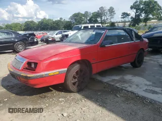 1991 Chrysler LeBaron with VIN 1C3XJ4535MG146711, listed as a Copart auction lot 54699705 with 49,396 mi miles and Salvage Title. Bid and sale history available at DreamBid. Image 1.
