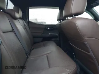 2018 Toyota Tacoma SR with VIN 5TFGZ5AN4JX142565, listed as a IAAI auction lot 41353718 with 87,544 mi miles and . Bid and sale history available at carsss.com. Image 8.