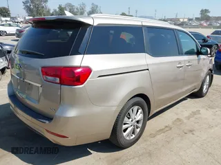2017 Kia Sedona LX with VIN KNDMB5C16H6254544, listed as a IAAI auction lot 41961809 with 124,658 mi miles. Bid and sale history available at carsss.com. Image 4.