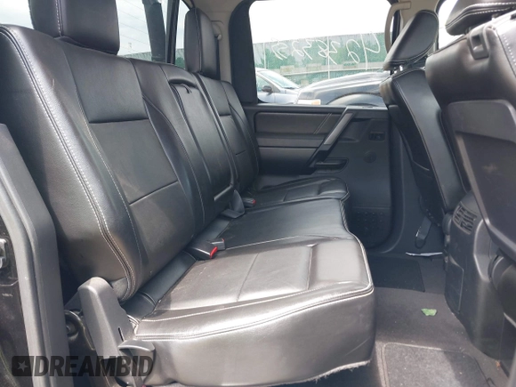 2013 Nissan Titan SV with VIN 1N6AA0EC4DN302479, listed as a IAAI auction lot 42383255 with 112,991 mi miles and . Bid and sale history available at DreamBid. Image 8.