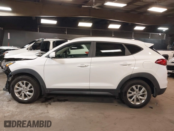 2019 Hyundai Tucson Value z VIN KM8J3CA47KU874061, wystawiony jako IAAI lot #41908116 z przebiegiem 60 754 mil mil oraz . Historia ofert i sprzedaży dostępna na DreamBid. Obrazek 14.