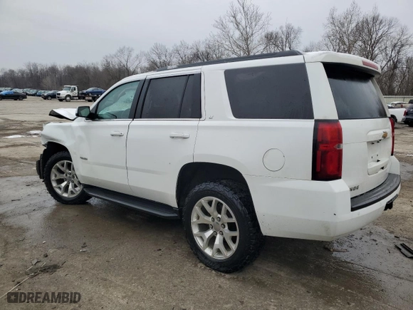 2019 Chevrolet Tahoe LT with VIN 1GNSKBKC0KR122479, listed as a Copart auction lot 44801145 with 108,183 mi miles and Salvage Title. Bid and sale history available at carsss.com. Image 2.