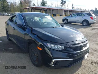 2021 Honda Civic Sedan LX with VIN 2HGFC2F66MH517914, listed as a IAAI auction lot 40809824 with 1 mi miles. Bid and sale history available at carsss.com. Image 1.