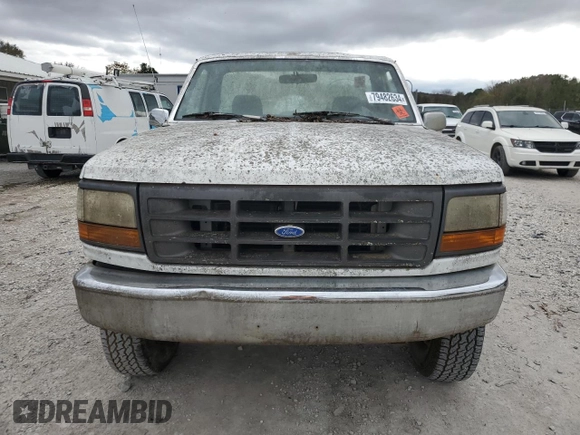 1993 Ford F-250 with VIN 1FTHF26H5PNA11633, listed as a Copart auction lot 79482634 with 186,709 mi miles and Salvage Title. Bid and sale history available at carsss.com. Image 5.