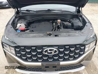 2023 Hyundai Santa Fe SEL with VIN 5NMS24AJ9PH533928, listed as a IAAI auction lot 41784157 with 56,903 mi miles and . Bid and sale history available at DreamBid. Image 10.