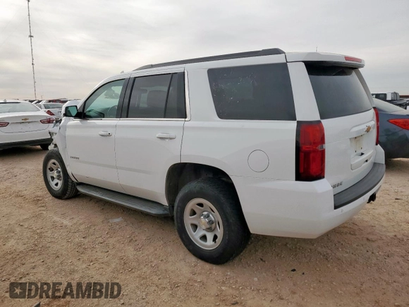 2018 Chevrolet Tahoe LS z VIN 1GNSKAKC4JR149743, wystawiony jako Copart lot #50081815 z przebiegiem 52 005 mil mil oraz Szkoda całkowita • Salvage title. Historia ofert i sprzedaży dostępna na DreamBid. Obrazek 2.