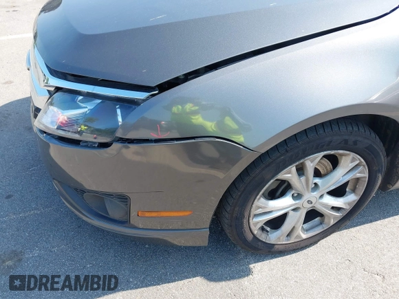 2012 Ford Fusion SE z VIN 3FAHP0HAXCR373911, wystawiony jako IAAI lot #42396082 z przebiegiem 237 100 mil mil oraz . Historia ofert i sprzedaży dostępna na DreamBid. Obrazek 13.