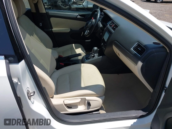 2014 Volkswagen Jetta TDI w/Premium/Nav with VIN 3VWLL7AJXEM366828, listed as a IAAI auction lot 42392563 with 132,924 mi miles and . Bid and sale history available at DreamBid. Image 5.
