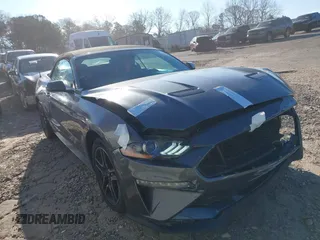2021 Ford Mustang EcoBoost z VIN 1FATP8UH3M5105279, wystawiony jako IAAI lot #41712821 z przebiegiem 99 760 mil mil oraz . Historia ofert i sprzedaży dostępna na DreamBid. Obrazek 1.