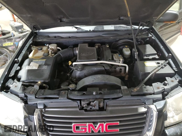 2003 GMC Envoy SLT with VIN 1GKDT13S232251871, listed as a Copart auction lot 45306785 with 174,303 mi miles and Salvage Title. Bid and sale history available at carsss.com. Image 12.