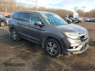 2016 Honda Pilot EX-L with VIN 5FNYF6H75GB053780, listed as a IAAI auction lot 41340590 with 203,190 mi miles. Bid and sale history available at carsss.com. Image 1.