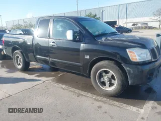 2004 Nissan Titan SE with VIN 1N6AA06A14N574940, listed as a IAAI auction lot 41821005 with 202,373 mi miles. Bid and sale history available at carsss.com. Image 1.