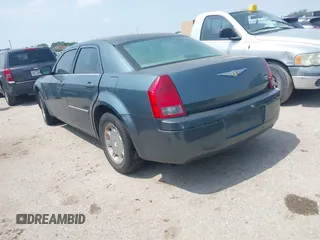 2006 Chrysler 300 Touring with VIN 2C3KA53G16H151319, listed as a IAAI auction lot 41917412 with 245,741 mi miles. Bid and sale history available at carsss.com. Image 3.