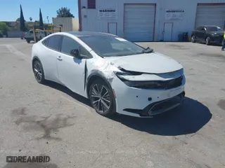 2024 Toyota Prius LE with VIN JTDACAAU1R3015637, listed as a IAAI auction lot 41216887 with 1 mi miles. Bid and sale history available at carsss.com. Image 1.