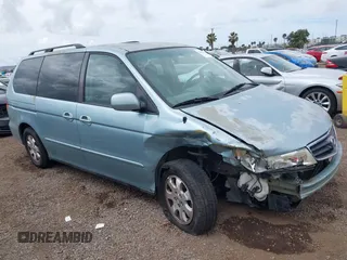 2004 Honda Odyssey EX-L with VIN 5FNRL18064B060817, listed as a IAAI auction lot 42032796 with 200,999 mi miles and . Bid and sale history available at DreamBid. Image 1.