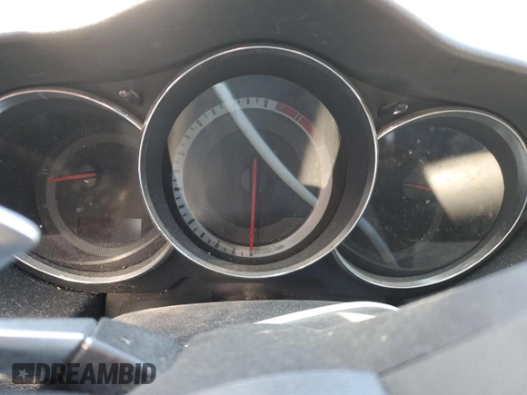 2011 Mazda RX-8 Grand Touring z VIN JM1FE1SM7B0405115, wystawiony jako Copart lot #72286084 z przebiegiem Nie podano mil oraz Szkoda całkowita • Salvage title. Historia ofert i sprzedaży dostępna na DreamBid. Obrazek 9.