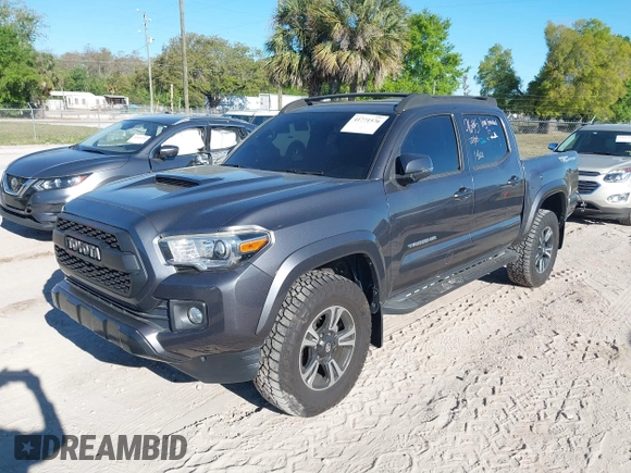 2017 Toyota Tacoma SR5 with VIN 5TFAZ5CNXHX050289, listed as a IAAI auction lot 41771576 with 68,735 mi miles and . Bid and sale history available at carsss.com. Image 2.