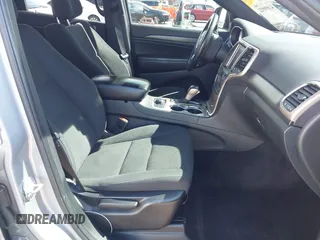 2016 Jeep Grand Cherokee Laredo z VIN 1C4RJFAG7GC392261, wystawiony jako IAAI lot #41890922 z przebiegiem 107 546 mil mil oraz . Historia ofert i sprzedaży dostępna na DreamBid. Obrazek 5.