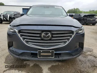 2021 Mazda CX-9 Touring with VIN JM3TCACY2M0512867, listed as a Copart auction lot 56646615 with 92,566 mi miles and Salvage title. Bid and sale history available at DreamBid. Image 5.