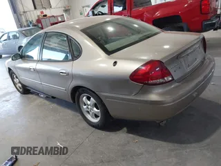 2006 Ford Taurus SE with VIN 1FAFP53U46A123827, listed as a IAAI auction lot 42042946 with 146,393 mi miles. Bid and sale history available at carsss.com. Image 3.