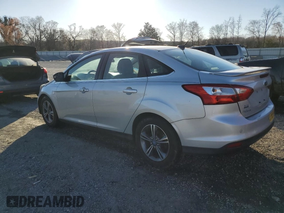 2013 Ford Focus Titanium with VIN 1FADP3J29DL148611, listed as a Copart auction lot 49645215 with 104,904 mi miles and Salvage Title. Bid and sale history available at carsss.com. Image 2.