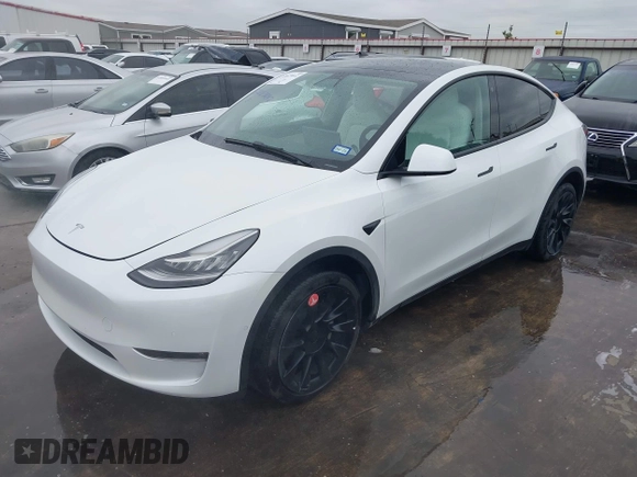 2022 Tesla Model Y Long Range z VIN 7SAYGDEE2NF420882, wystawiony jako IAAI lot #42023642 z przebiegiem 19 783 mil mil oraz . Historia ofert i sprzedaży dostępna na DreamBid. Obrazek 2.