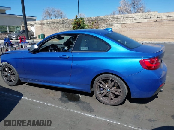 2015 BMW 2 Series M235i with VIN WBA1J7C59FV254140, listed as a IAAI auction lot 41642427 with 23,957 mi miles and . Bid and sale history available at carsss.com. Image 15.