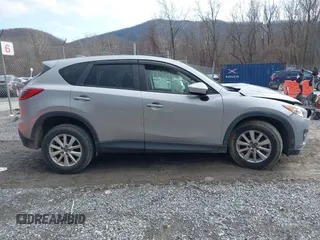 2013 Mazda CX-5 Touring with VIN JM3KE2CE9D0133348, listed as a IAAI auction lot 41357592 with 122,227 mi miles. Bid and sale history available at carsss.com. Image 12.