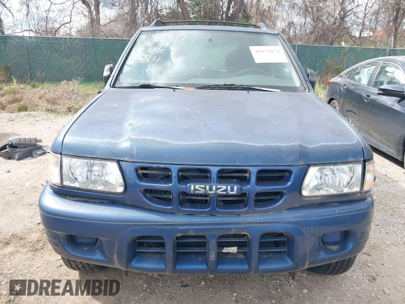 2002 Isuzu Rodeo S with VIN 4S2CK58W124320988, listed as a IAAI auction lot 41921874 with 227,320 mi miles and . Bid and sale history available at DreamBid. Image 6.