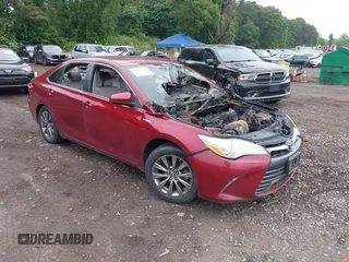 2015 Toyota Camry LE z VIN 4T1BD1FK8FU144386, wystawiony jako IAAI lot #42457518 z przebiegiem 8 mil mil oraz . Historia ofert i sprzedaży dostępna na DreamBid. Obrazek 1.