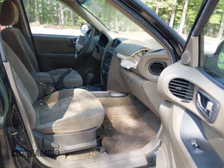 2004 Hyundai Santa Fe GLS z VIN KM8SC73DX4U610845, wystawiony jako IAAI lot #42224206 z przebiegiem 163 179 mil mil oraz . Historia ofert i sprzedaży dostępna na DreamBid. Obrazek 5.